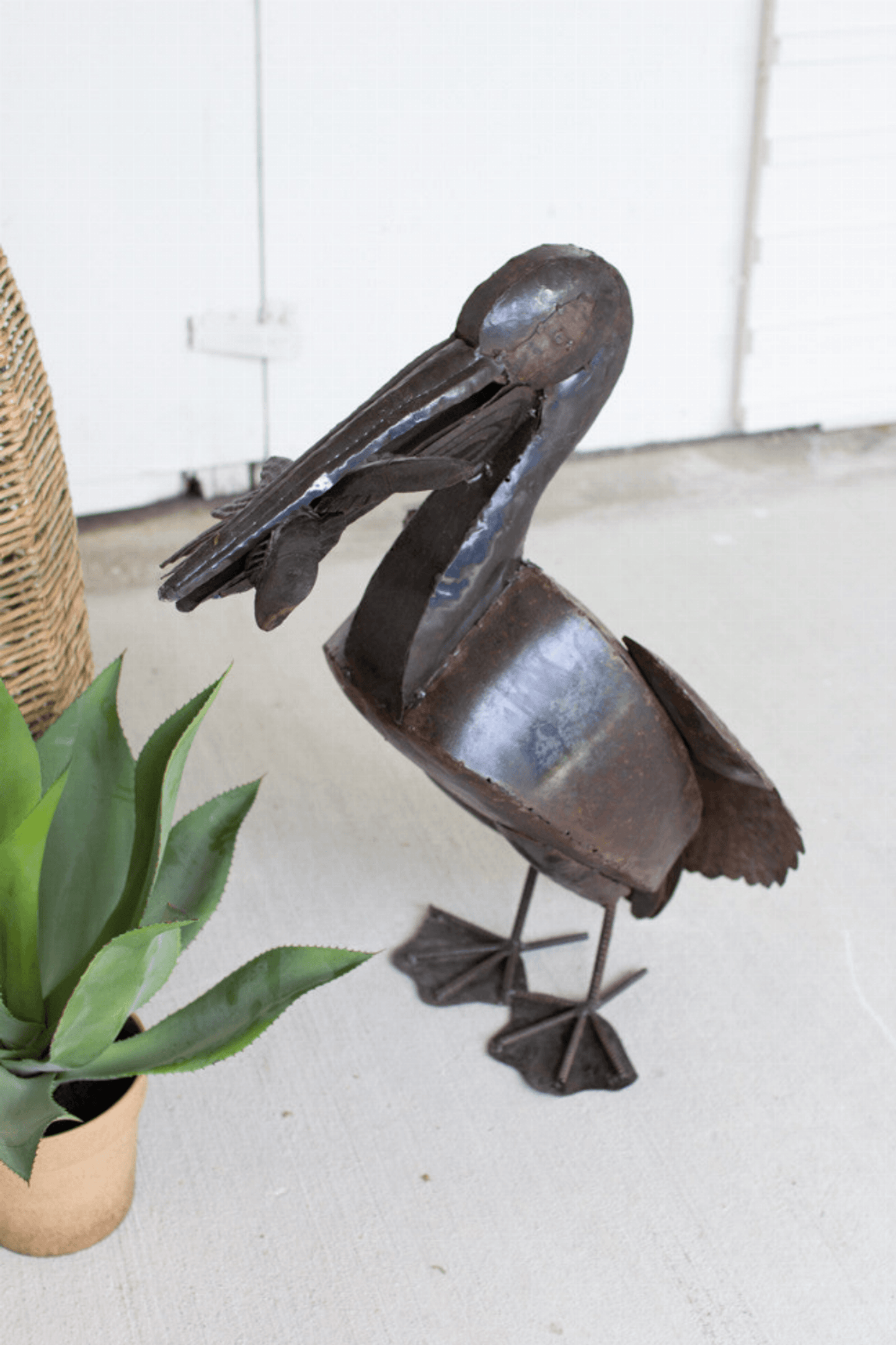 Rustic Recycled Metal Pelican Sculpture With Fish