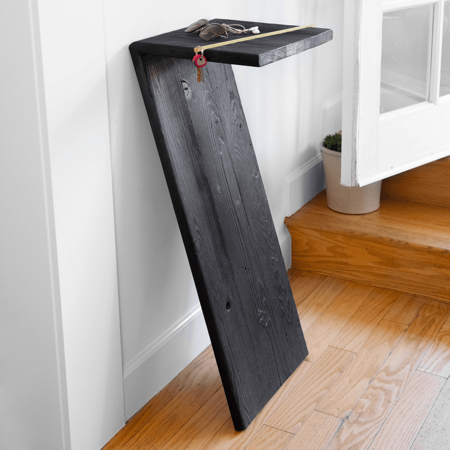 Elevated 7 Console Table With Charred Finish And Brass Accent