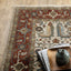 3' X 5' Ivory Red Green Grey Blue And Navy Oriental Power Loom Stain Resistant Area Rug With Fringe