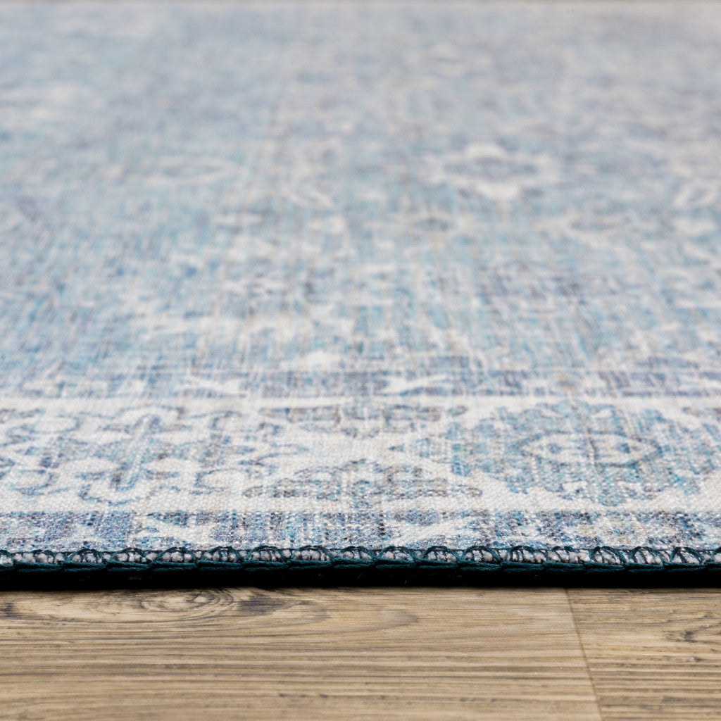 5' X 7' Blue And Grey Oriental Power Loom Stain Resistant Area Rug