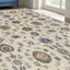 4' X 6' Ivory and Blue Wool Floral Hand Tufted Area Rug