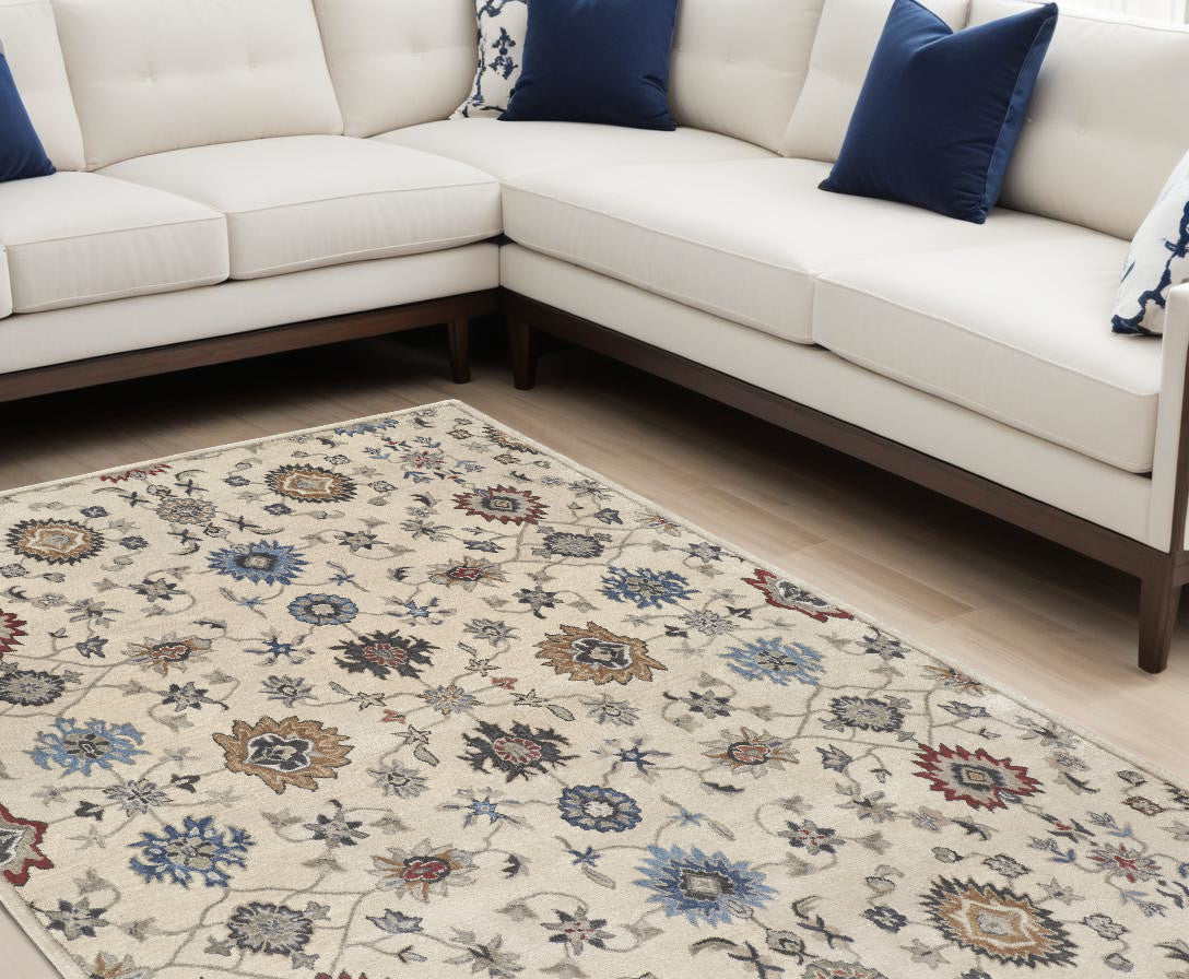 4' X 6' Ivory and Blue Wool Floral Hand Tufted Area Rug