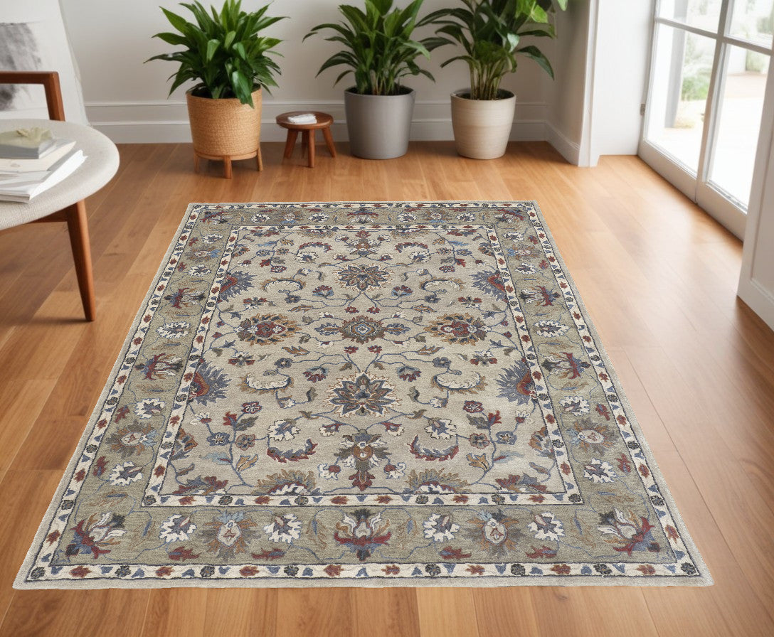 4' X 6' Ivory and Blue Wool Floral Hand Tufted Area Rug