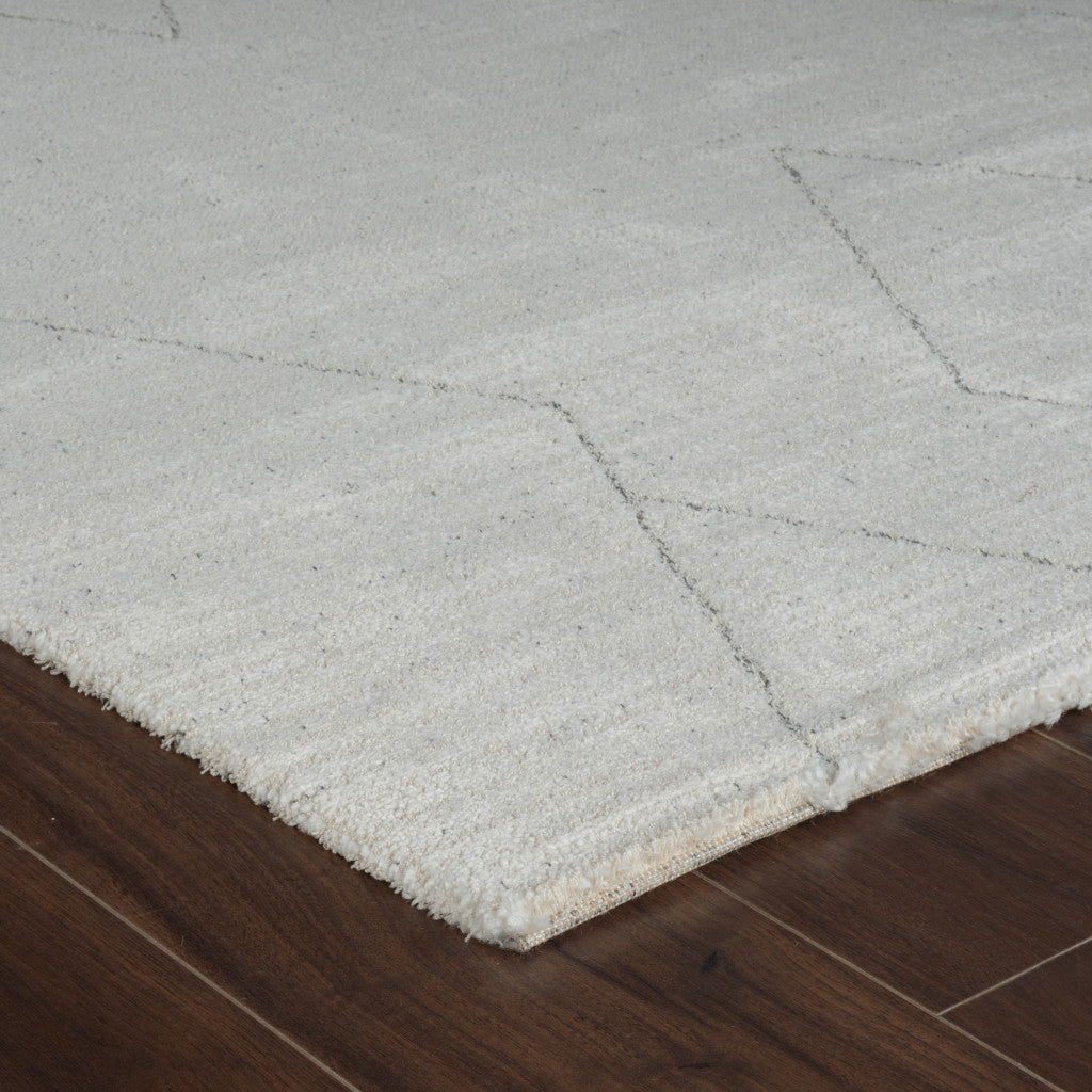 8' Cream and Beige Abstract Distressed Area Rug