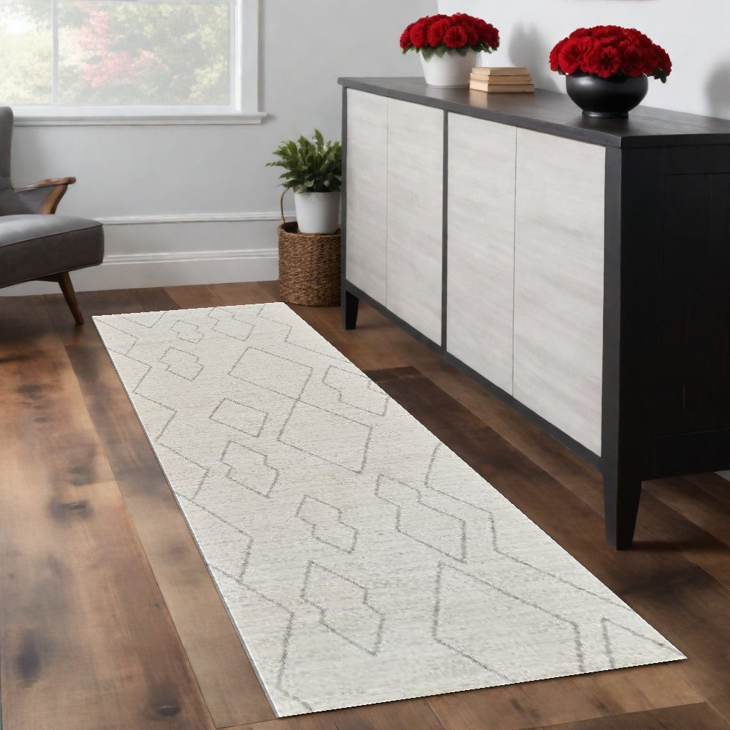 8' Cream and Beige Abstract Distressed Area Rug