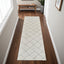 8' Cream and Beige Abstract Distressed Area Rug