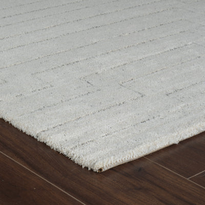 8' Cream and Beige Abstract Distressed Area Rug