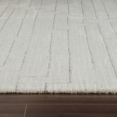 8' Cream and Beige Abstract Distressed Area Rug