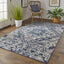 6' X 9' Gray Blue and Ivory Oriental Power Loom Area Rug