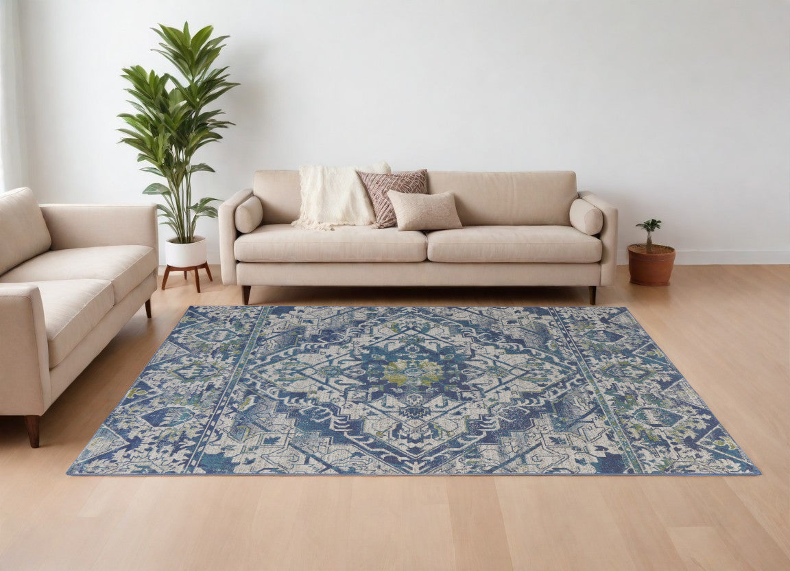 6' X 9' Gray Blue and Ivory Oriental Power Loom Area Rug