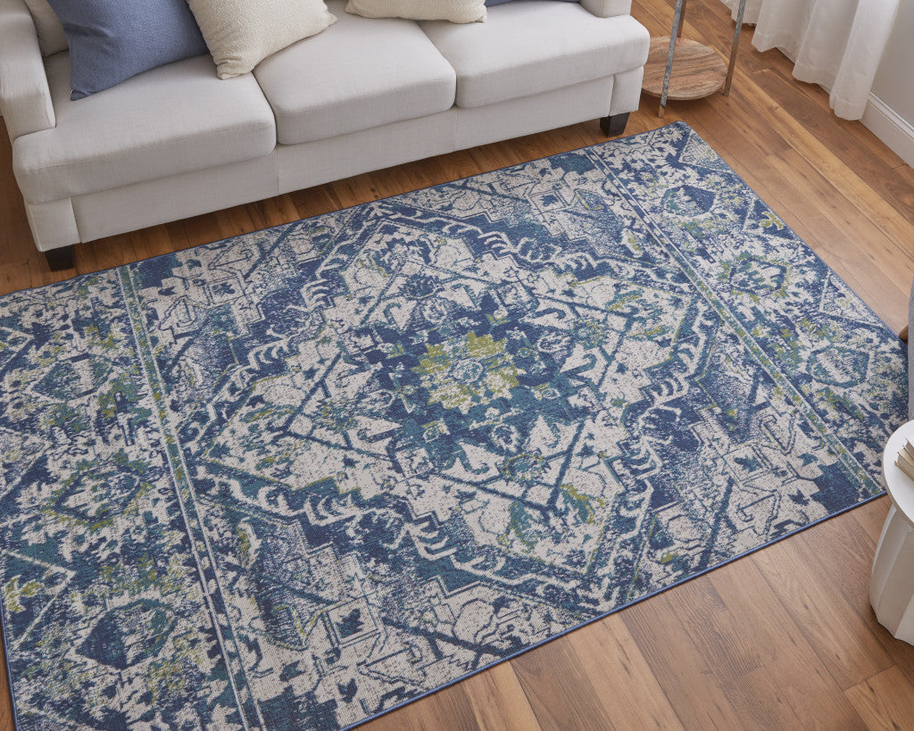 6' X 9' Gray Blue and Ivory Oriental Power Loom Area Rug