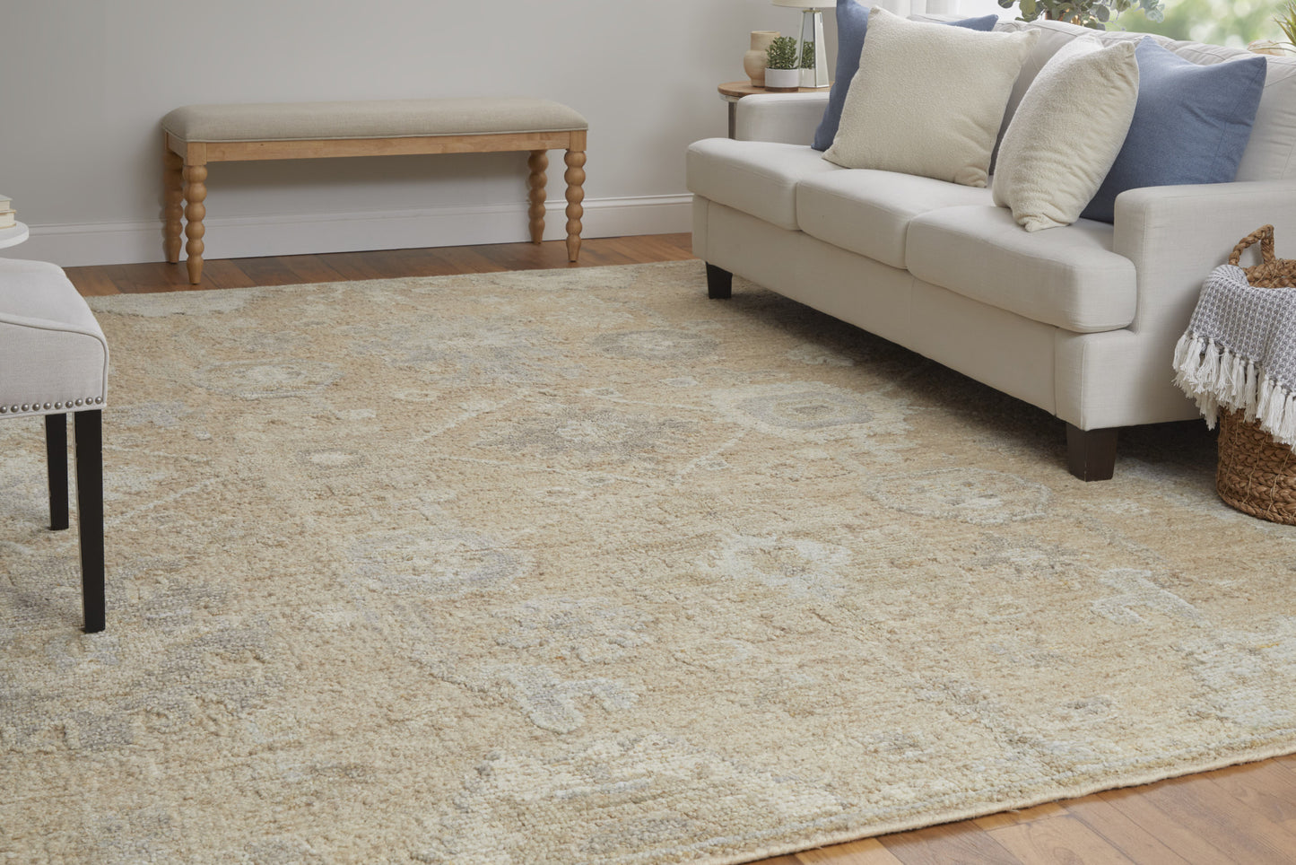 6' X 9' Tan and Ivory Wool Floral Hand Knotted Area Rug