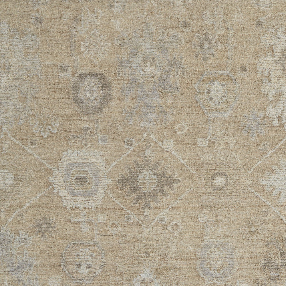 6' X 9' Tan and Ivory Wool Floral Hand Knotted Area Rug