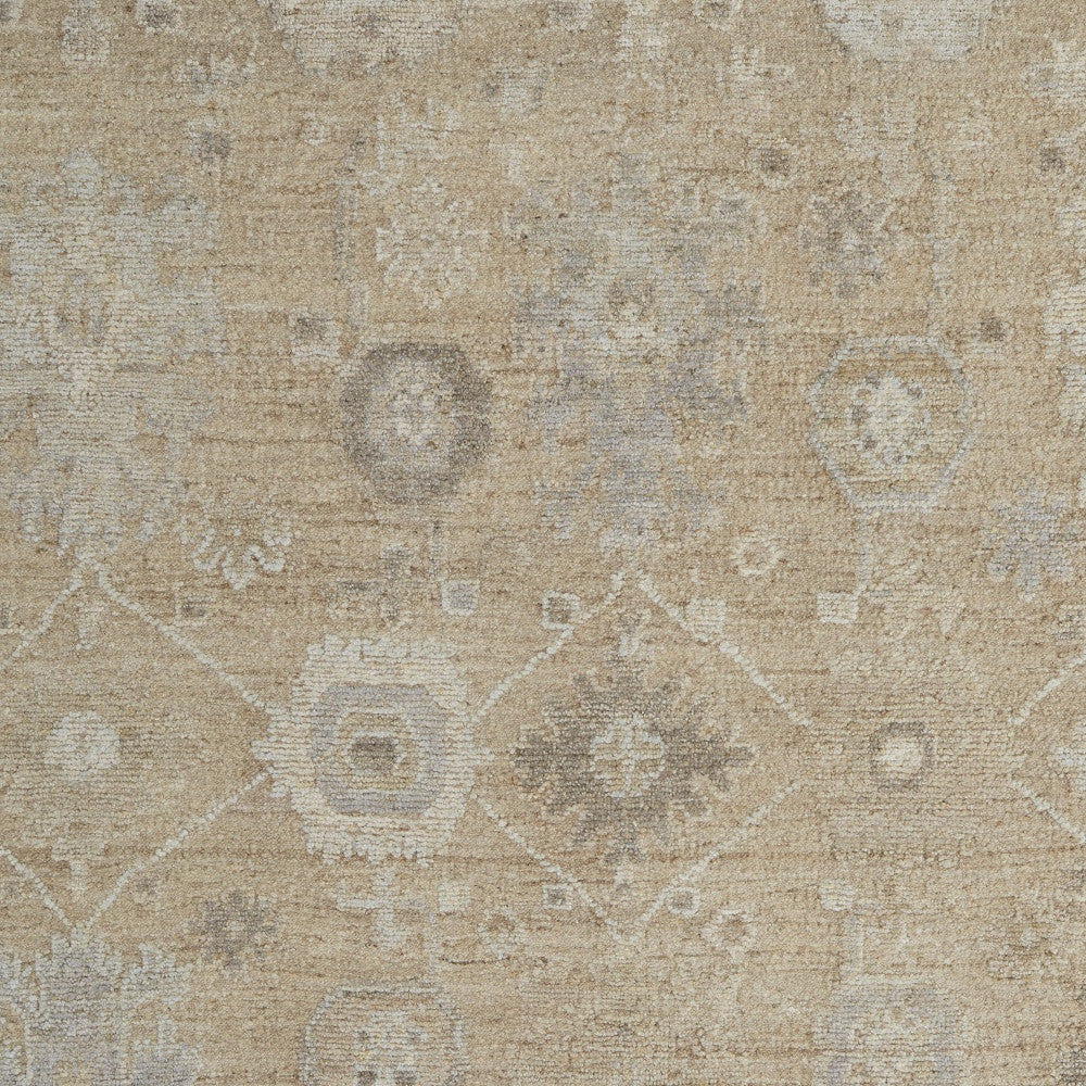 6' X 9' Tan and Ivory Wool Floral Hand Knotted Area Rug