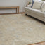 6' X 9' Tan and Ivory Wool Floral Hand Knotted Area Rug